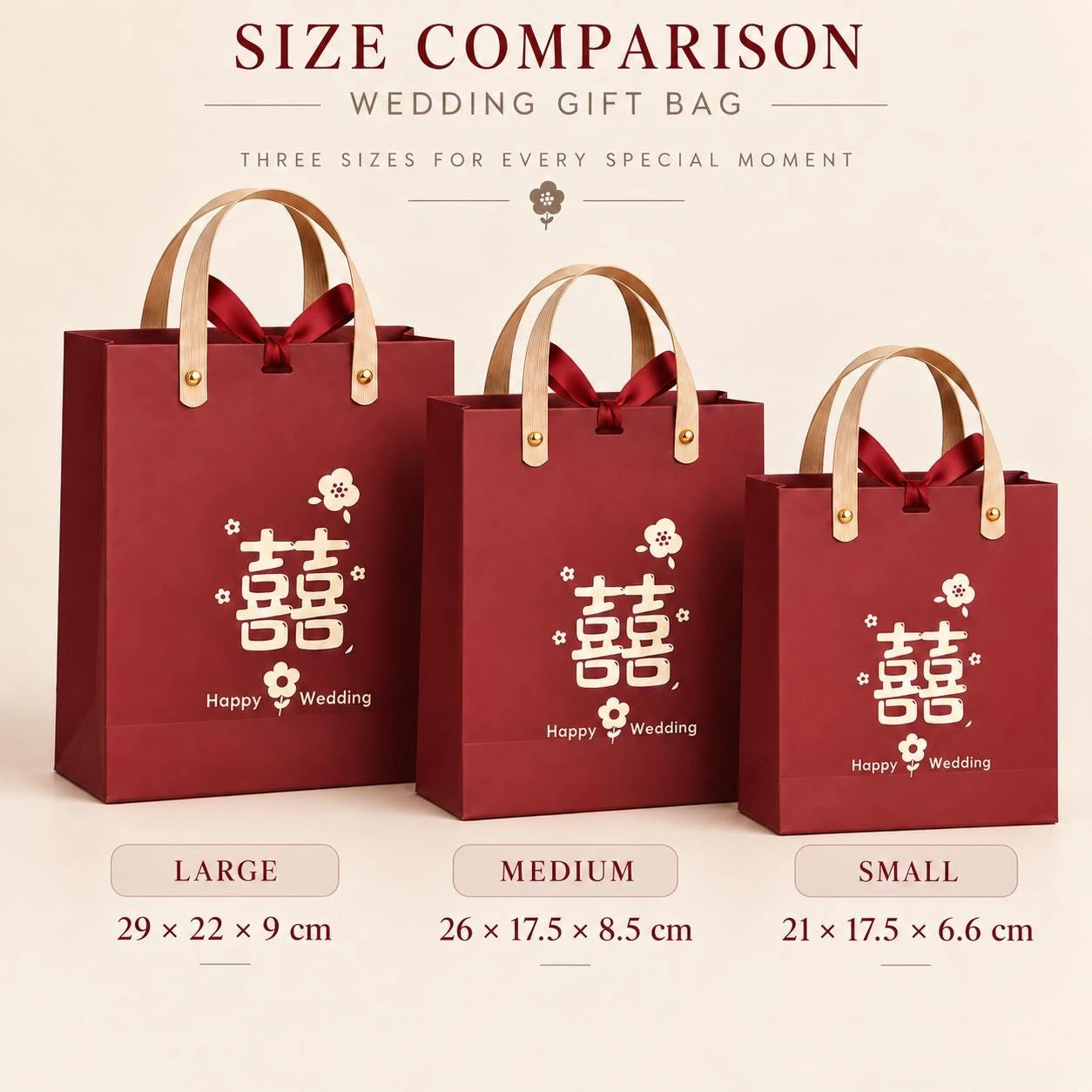 May include: Three maroon gift bags with light-colored handles and dark red ribbons. Each bag features a gold double happiness symbol, a small flower icon, and the text "Happy Wedding". Dimensions are 29x22x9 cm, 26x17.5x8.5 cm, and 21x17.5x6.6 cm.