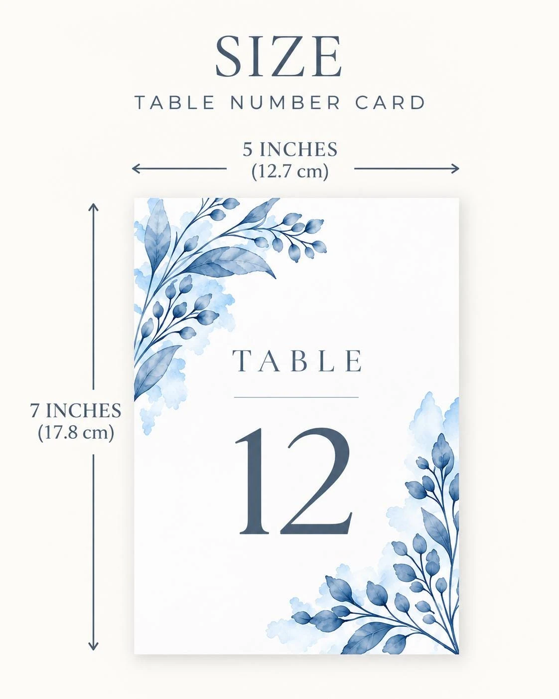 May include: A rectangular table number card featuring blue watercolor botanical illustrations in the top-left and bottom-right corners. The text reads "TABLE 12". The card measures 5 inches wide by 7 inches high as indicated by the dimension arrows.